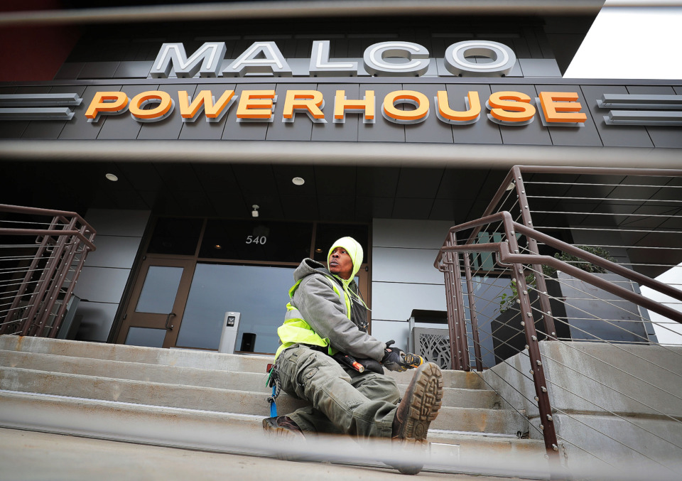 <strong>Joseph Ragland installs lighting on the front steps at the new Malco Powerhouse theater in Downtown Memphis on Thursday, March 7, 2019.</strong> (Jim Weber/Daily Memphian)