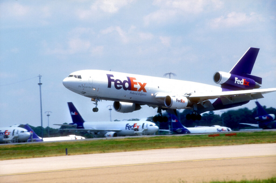 <strong>A FedEx plane lands during the day on Thursday, Aug. 17, 2006 at the FedEx hub in Memphis.</strong> (AP File Photo/Greg Campbell)