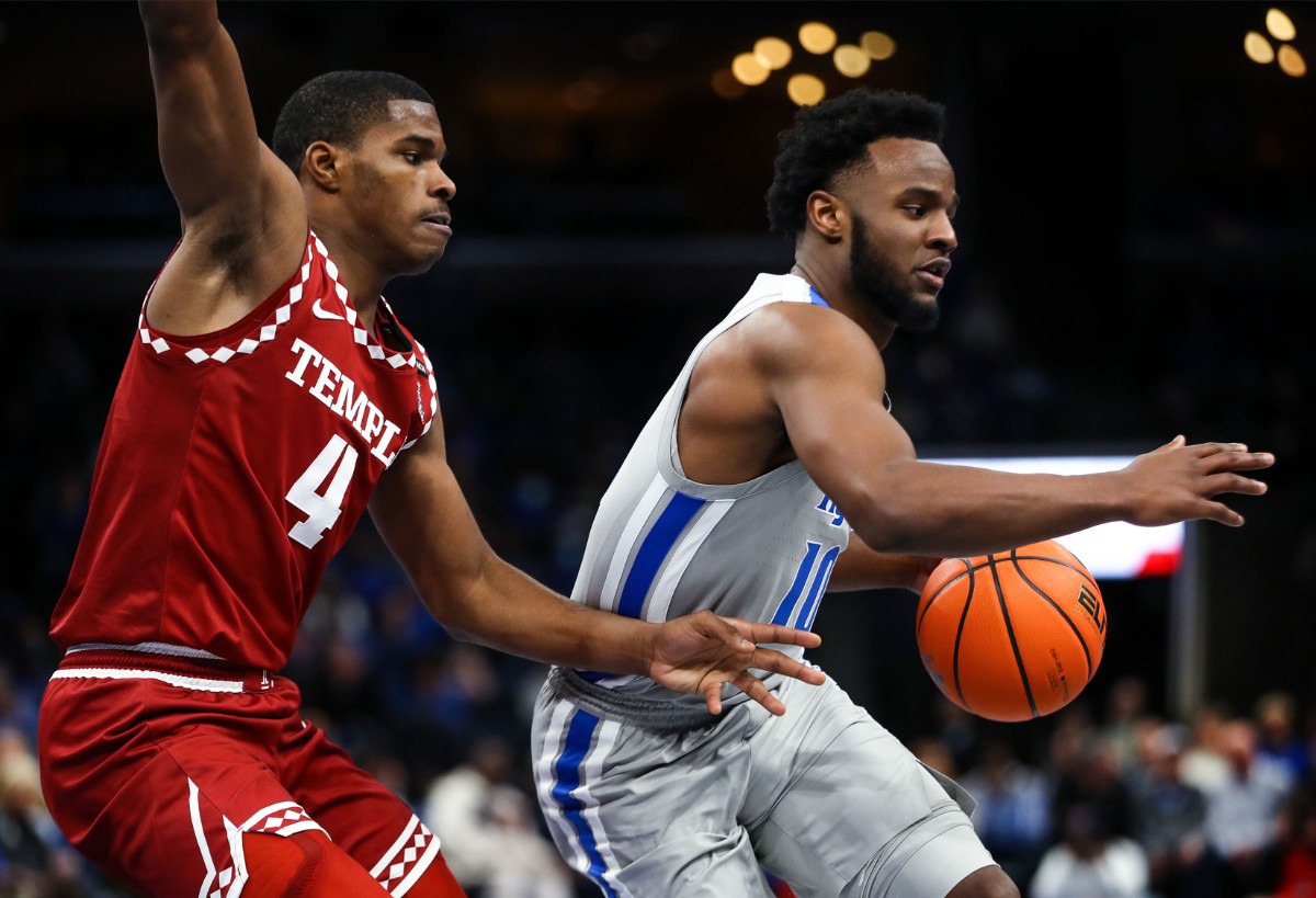 <strong>University of Memphis guard Alex Lomax (10) brings the ball upcourt against Temple on Feb. 24 at FedExForum.</strong> (Patrick Lantrip/Daily Memphian)