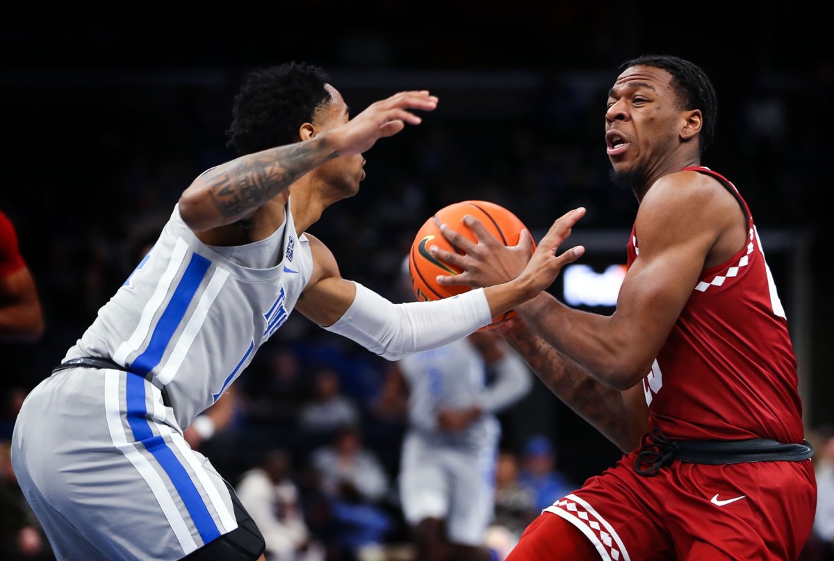 <strong>University of Memphis guard Tyler Harris (14) defends Temple guard Jeremiah Williams (25) on Feb. 24 at FedExForum.</strong> (Patrick Lantrip/Daily Memphian)