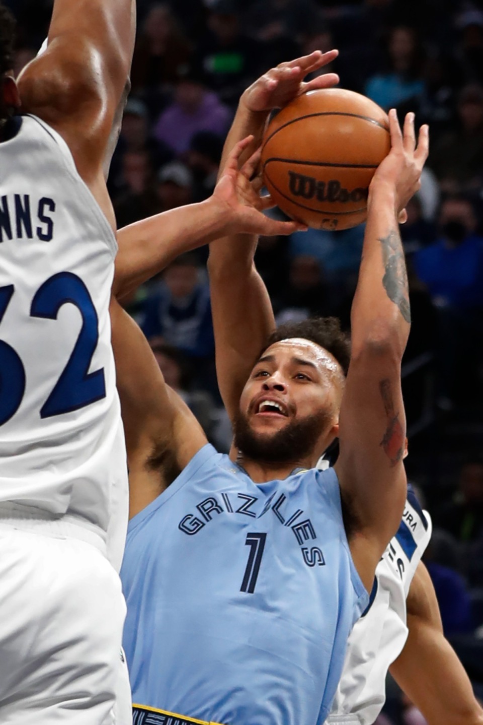 <strong>Grizzlies forward Kyle Anderson (1) goes up for a shot against the Timberwolves on Feb. 24, 2022, in Minneapolis.</strong> (Bruce Kluckhohn/AP)