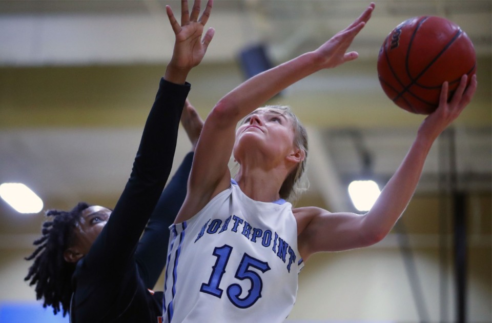 <strong>Northpoint Christian School forward Brylee Cherry (15) goes for a layup against Middle Tennessee Christian School on Feb. 25.</strong> (Patrick Lantrip/Daily Memphian)