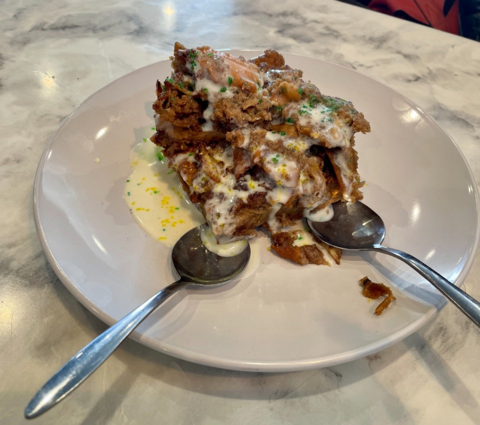 <strong>King cake bread pudding at 2 Crazy Fellas has a cinnamon flavor and the sweet sauce over the top is made with cream cheese.&nbsp;It&rsquo;s a bargain at $8, and enough to split among four people.</strong> (Jennifer Biggs/The Daily Memphian)