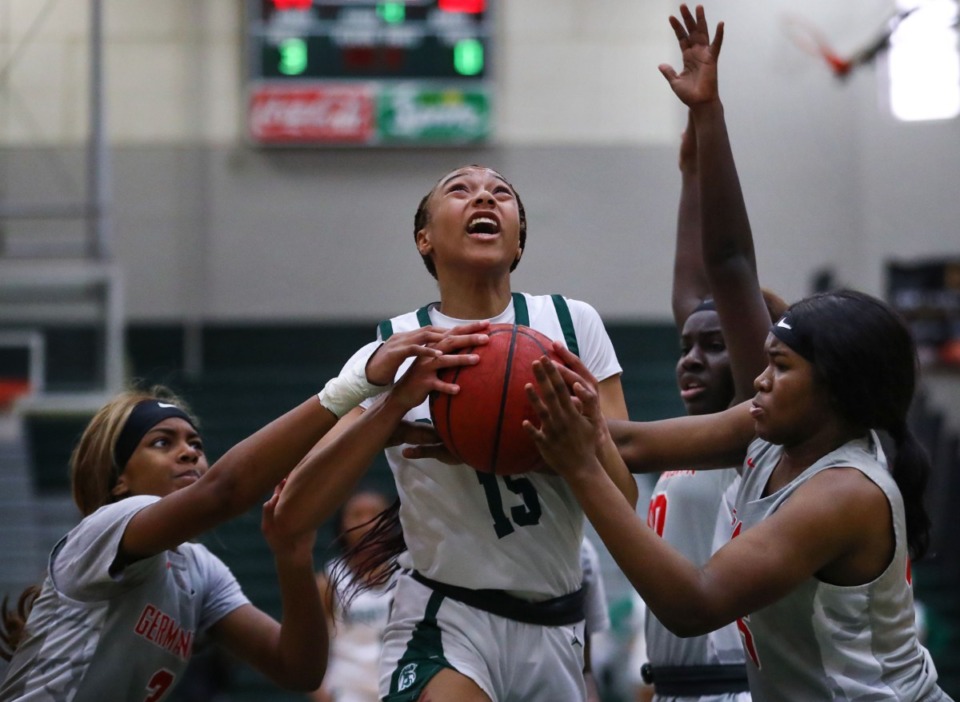 <strong>White Station guard Sihirah Reese (15) goes up for a layup during a Feb. 12, 2022 game against Germantown.</strong> (Patrick Lantrip/Daily Memphian)