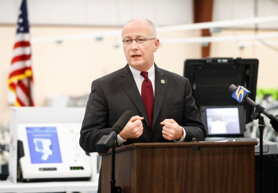 <strong>Shelby County Election Commission chairman Brent Taylor speaks Monday, Feb. 28, about the acquisition of new voting machines. Taylor resigned Monday from the election commission. &ldquo;I believe my tenure has been fruitful and successful,&rdquo; he said.</strong> (Mark Weber/The Daily Memphian file)