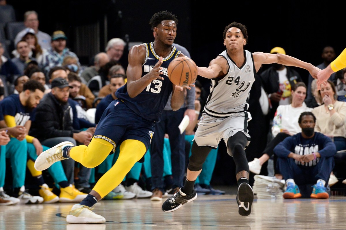 <strong>Memphis Grizzlies forward Jaren Jackson Jr. (13) is defended by San Antonio Spurs guard Devin Vassell (24) on Feb. 28, 2022, at FedExForum.</strong> (Brandon Dill/AP)