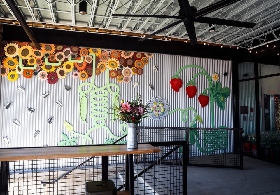 <strong>Art work is displayed on the patio of the new Downtown South Point Grocery store on Wednesday, March 2. There&rsquo;s seating for 42 on the patio.</strong>&nbsp;(Mark Weber/The Daily Memphian)