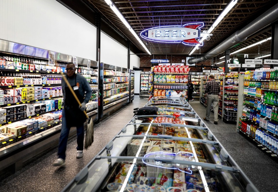 <strong>Downtown&rsquo;s new South Point Grocery has 9,000 square feet of shopping space, and is decorated with neon signs hanging from the ceiling to help shoppers find their way around.</strong> (Mark Weber/The Daily Memphian)