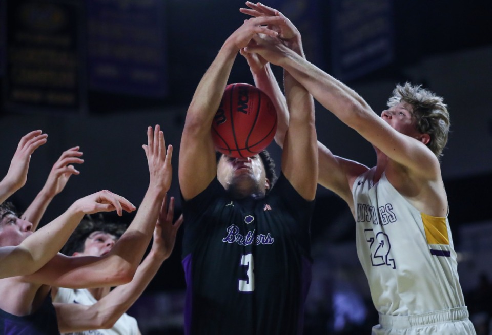 <strong>CBHS forward Ashton Strother (3) fights for a rebound during against Lipscomb Academy on March 3, 2022.</strong> (Patrick Lantrip/Daily Memphian)