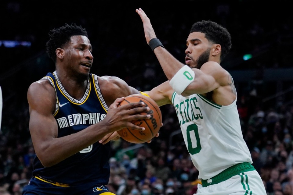 <strong>Memphis Grizzlies forward Jaren Jackson Jr. tries to drive past Boston Celtics forward Jayson Tatum Thursday, March 3, in Boston.</strong> (Charles Krupa/Associated Press)