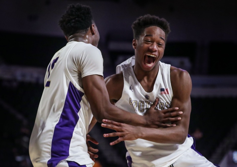 <strong>CBHS freshman Gavin Jellow (15) and senior Zion Owens (12) celebrate Saturday, March 5, after winning the TSSAA Div. II Class AA state championship game against Knoxville Catholic at Hooper Eblen Center in Cookeville, Tennessee.</strong> (Patrick Lantrip/Daily Memphian)