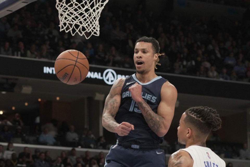 <strong>Memphis Grizzlies' Brandon Clarke (15) reacts after a basket in the first half of an NBA basketball game against the Orlando Magic, Saturday, March 5, 2022.</strong> (AP Photo/Karen Pulfer Focht)