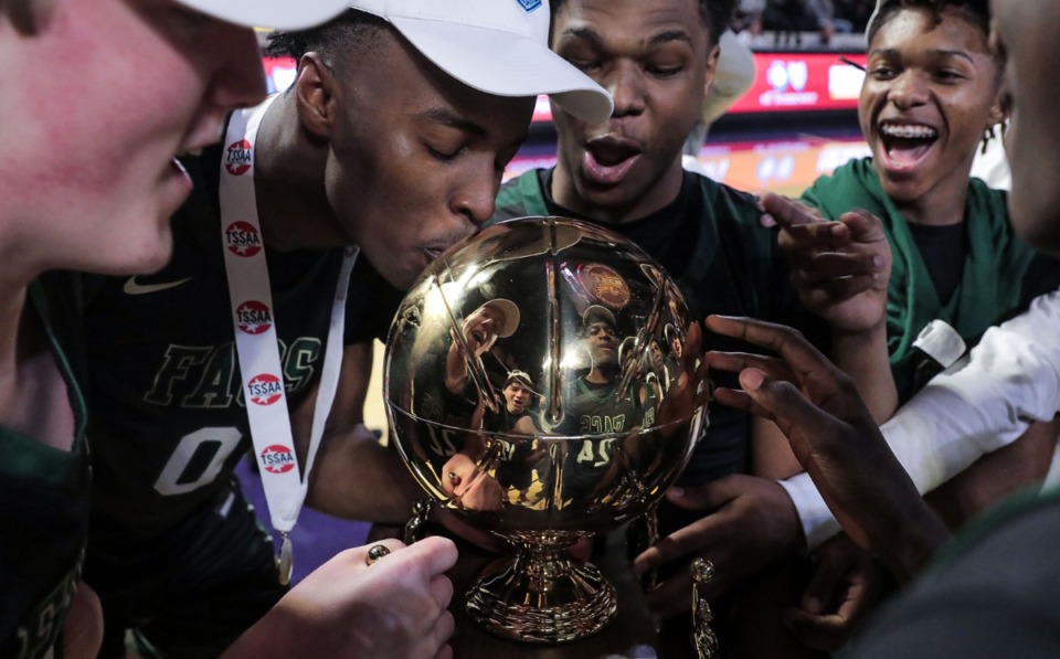 <strong>FACS senior guard Daniel Egbuniwe (0) kisses the TSSAA state championship trophy after defeating Goodpasture Christian School Saturday, March 5 in Cookeville, Tennessee.</strong> (Patrick Lantrip/Daily Memphian)