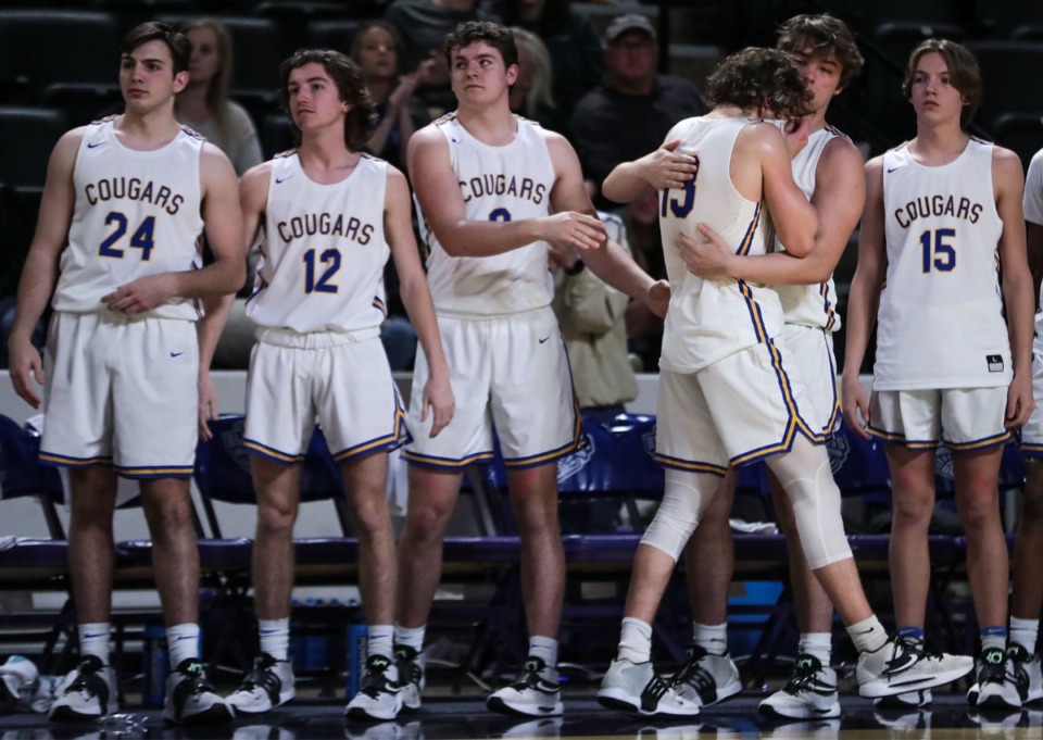 <strong>Teammates comfort Goodpasture Christian School senior Chandler Woosley (13) in the waning seconds of a loss to FACS in the TSSAA state championship game in Cookeville, Tennessee.</strong> (Patrick Lantrip/Daily Memphian)
