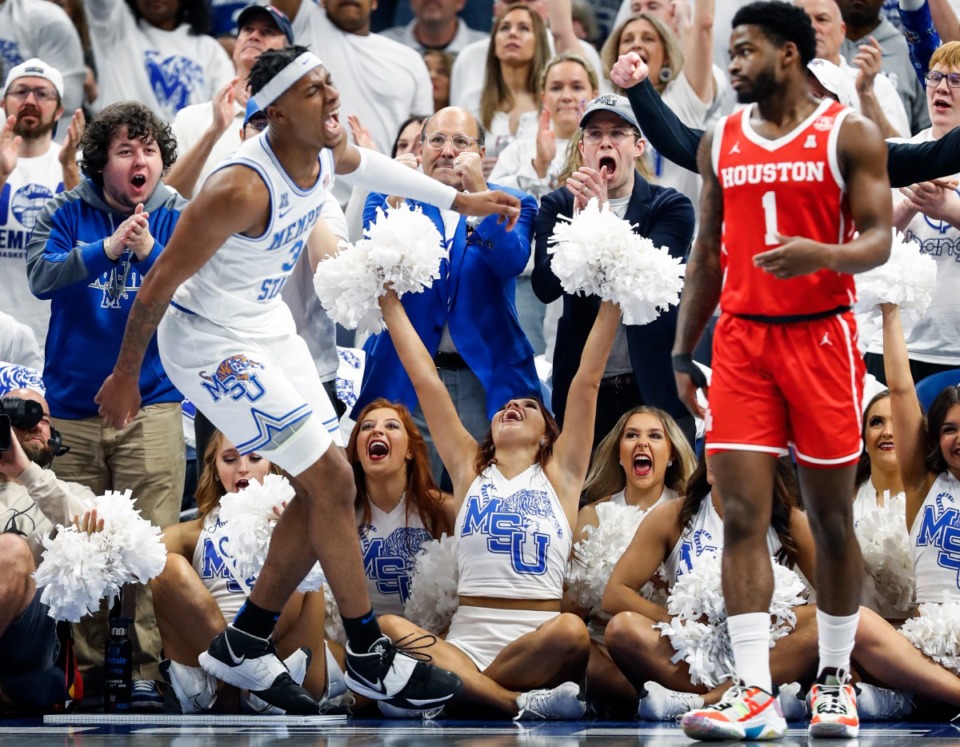 <strong>Memphis fans celebrate a Landers Nolley II (left) made basket against Houston during game on Sunday, March 6, 2022.</strong> (Mark Weber/The Daily Memphian)