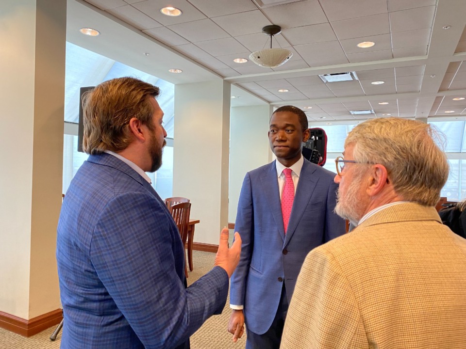 <strong>Deputy U.S. Treasury Secretary Wally Adeyemo talks with Memphis City Council members Chase Carlisle (left) and Jeff Warren (right) during his visit to the city Tuesday, March 8.</strong> (Bill Dries/ The Daily Memphian)