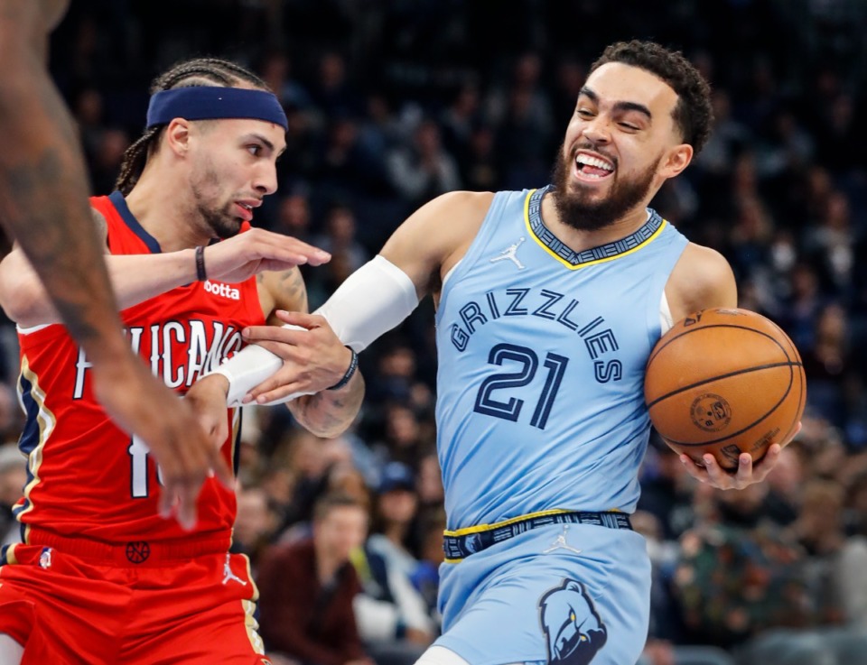 <strong>Memphis Grizzlies guard Tyus Jones (right) drives the lane against New Orleans&rsquo; Jose Alvarado (left) on Tuesday, March 8, 2022.</strong> (Mark Weber/The Daily Memphian)
