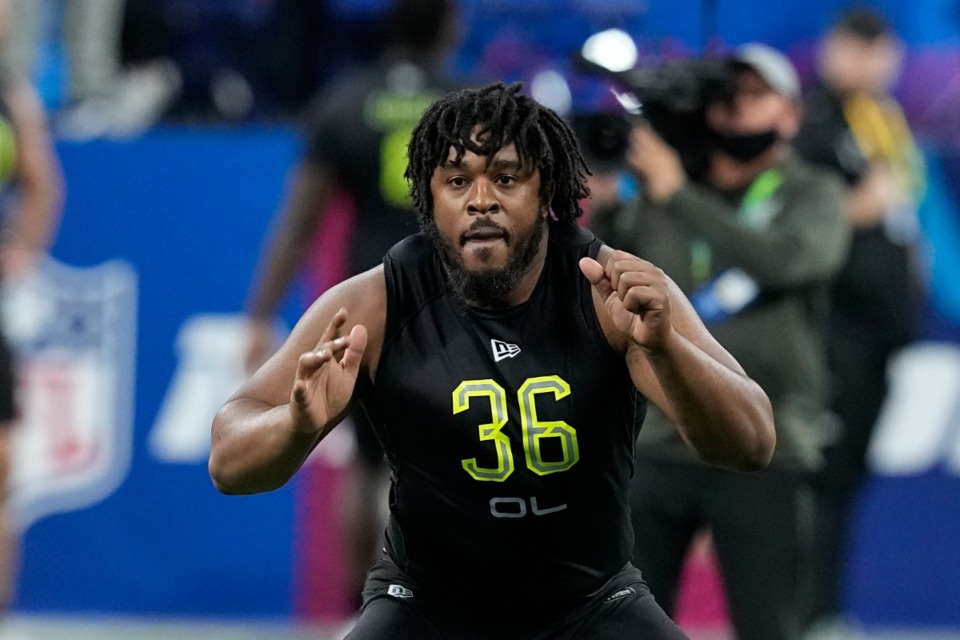<strong>Dylan Parham runs a drill during the NFL football scouting combine, Friday, March 4, 2022, in Indianapolis.</strong> (AP Photo/Darron Cummings)
