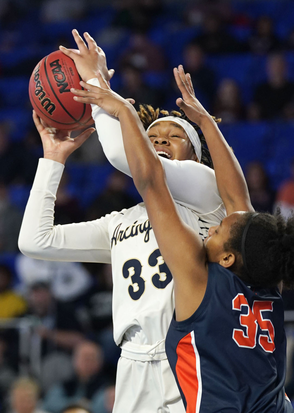<strong>Beech&rsquo;s Bailey Ford (35) applies pressure to Arlington&rsquo;s Ka'mbili Nelson (33) during the Division I, Class 4A game Wednesday March 9, in Murfreesboro.</strong>&nbsp;(Mark Weber/The Daily Memphian)
