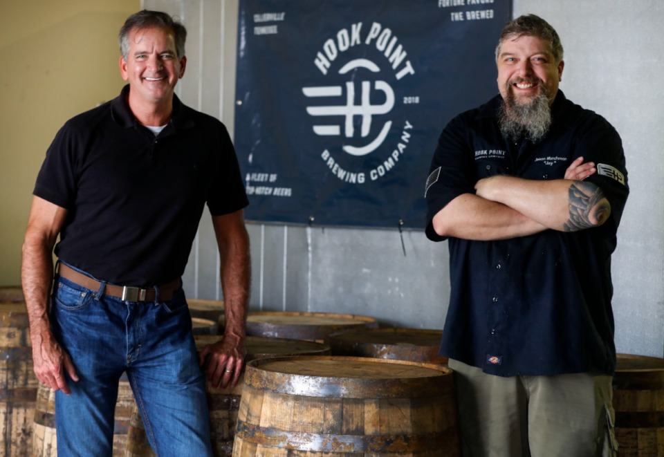 <strong>Mike Sadler (left) is the founder of&nbsp;Hook Point Brewing Co., and Jay Marchmon (right) is the head brew master.</strong> (Mark Weber/Daily Memphian file)