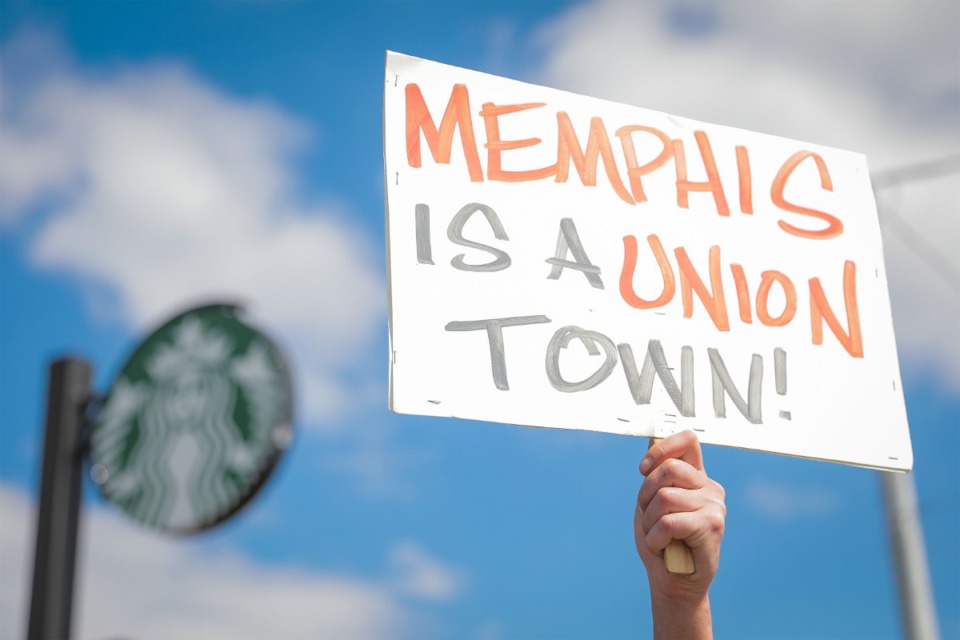 <strong>A marcher carries a sign reading "Memphis is a Union Town" at a demonstration supporting unionization of the Starbucks on Poplar Avenue near Poplar Plaza.</strong> (Patrick Lantrip/Daily Memphian)