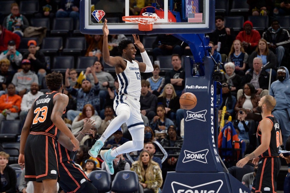 <strong>Memphis Grizzlies forward Jaren Jackson Jr. (13) reacts after a dunk against the New York Knicks on March 11.</strong> (Brandon Dill/AP)