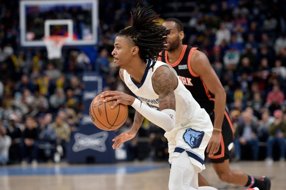<strong>Memphis Grizzlies guard Ja Morant (12) drives to the basket against the New York Knicks on March 11.</strong> (Brandon Dill/AP)