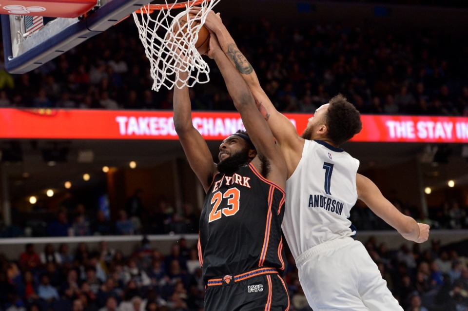 <strong>Memphis Grizzlies forward Kyle Anderson (1) blocks a shot by New York Knicks center Mitchell Robinson (23) on March 11.</strong> (Brandon Dill/AP)