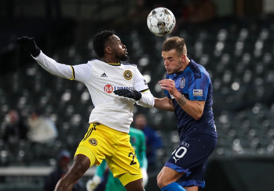 <strong>Memphis 901 FC defender Niall Logue (50) goes up for a header during Saturday&rsquo;s home match against the Pittsburgh Riverhounds.</strong> (Patrick Lantrip/Daily Memphian)