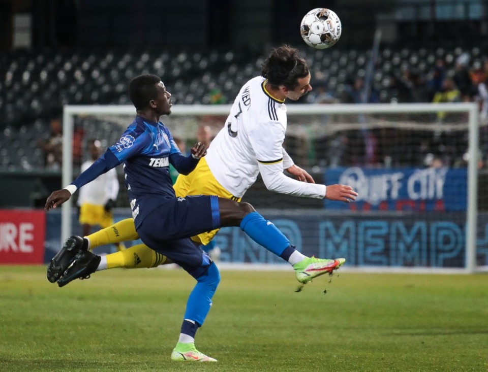 <strong>Memphis 901 FC forward Laurent Kissiedou (11) fights for the ball during the match against the Pittsburgh Riverhounds.</strong> (Patrick Lantrip/Daily Memphian)