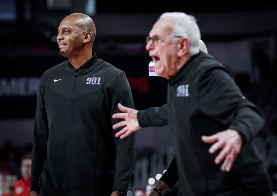 <strong>Tigers head coach Penny Hardaway and assistant coach Larry Brown celebrate on the sidelines during action against SMU on Saturday, March 12, 2022 in Fort Worth, Texas.</strong> (Mark Weber/The Daily Memphian)