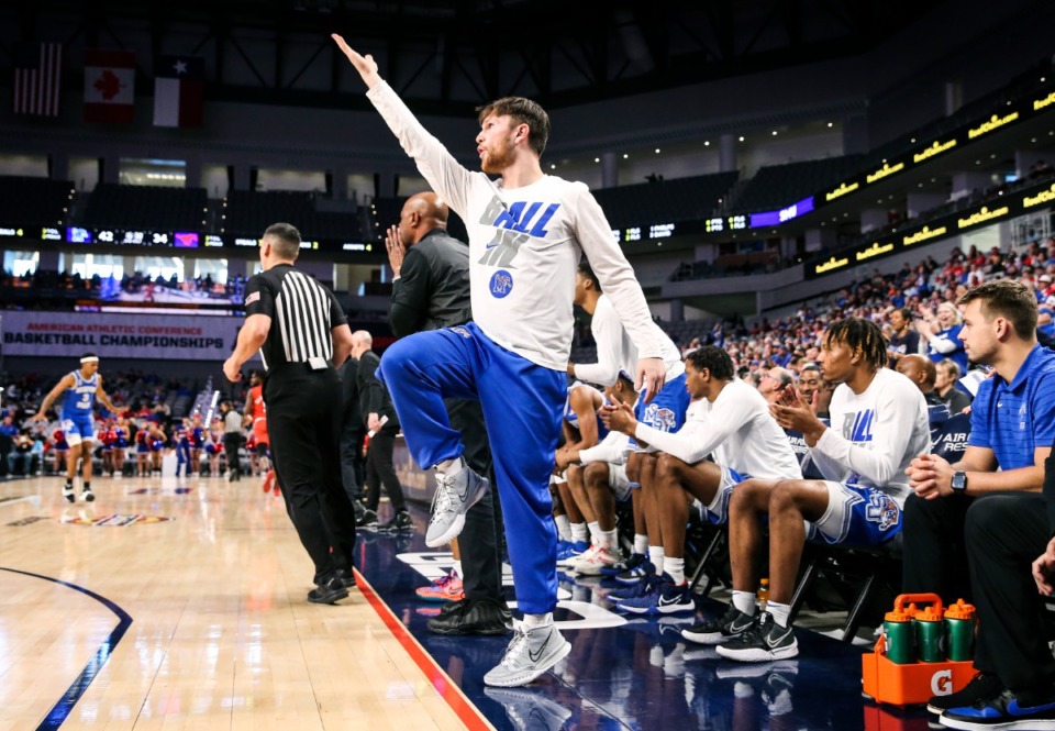 <strong>The Tigers&rsquo; Conor Glennon celebrates an Alex Lomax layup during action against SMU on Saturday in Fort Worth, Texas.</strong> (Mark Weber/The Daily Memphian)