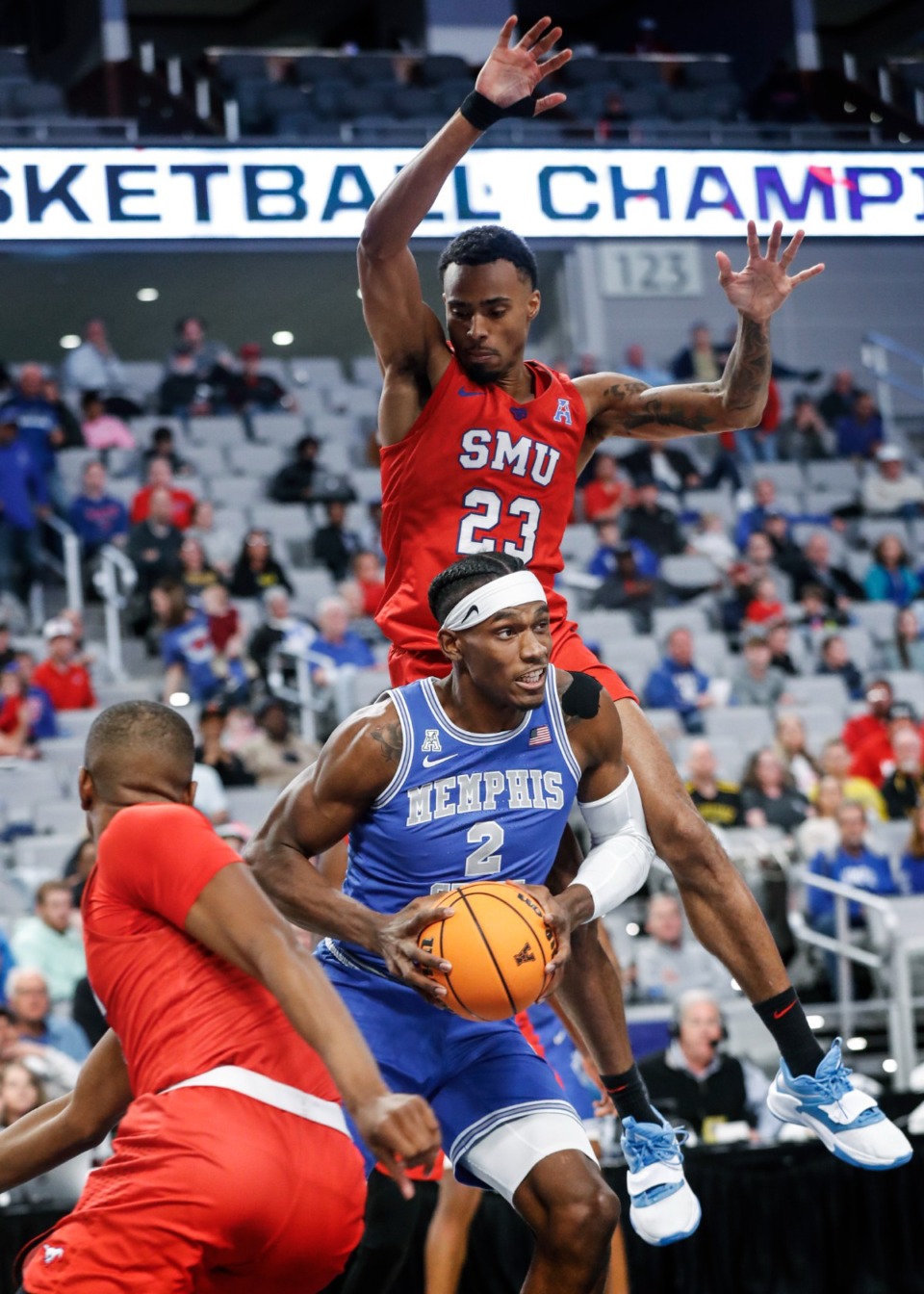 <strong>Tigers center Jalen Duren (middle) is fouled by SMU defender Michael Weathers (top) during action on Saturday, March 12, 2022 in Fort Worth, Texas.</strong> (Mark Weber/The Daily Memphian)