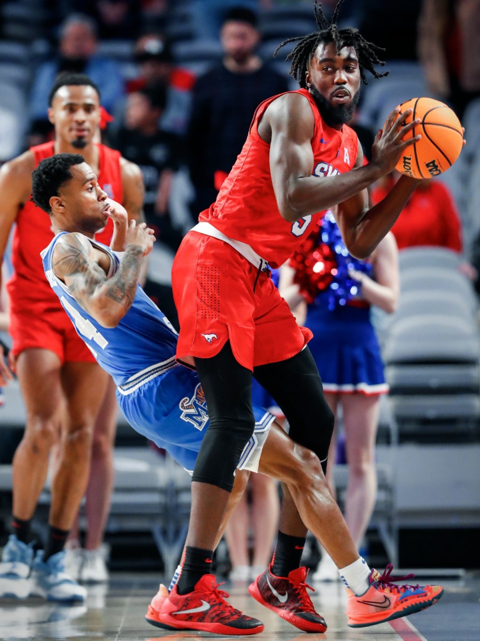 <strong>Tigers defender Tyler Harris (left) applies pressure to SMU guard Emmanuel Bandoumel (right) during action on Saturday, March 12, 2022 in Fort Worth, Texas.</strong> (Mark Weber/The Daily Memphian)