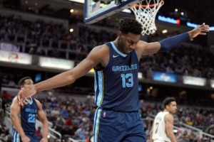 <strong>Memphis Grizzlies' Jaren Jackson Jr. reacts after hitting a shot and getting fouled on March 15, 2022, in Indianapolis.</strong> (Darron Cummings/AP)