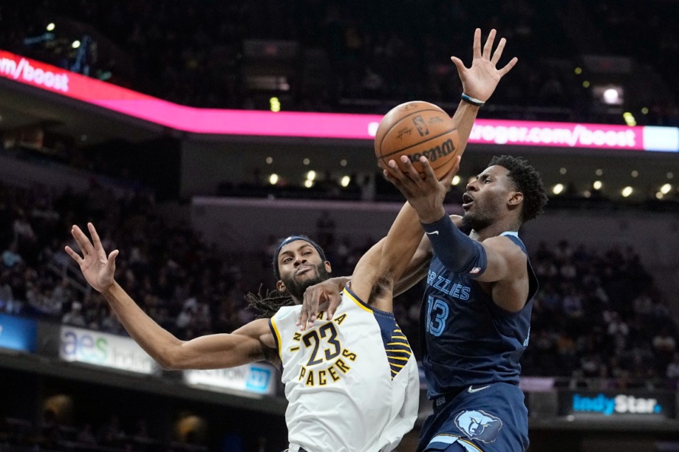<strong>Memphis Grizzlies' Jaren Jackson Jr. (13) shoots against Indiana&rsquo;s Isaiah Jackson (23)&nbsp;on March 15, 2022, in Indianapolis.</strong> (Darron Cummings/AP)