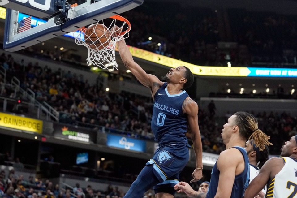 <strong>Memphis Grizzlies' De'Anthony Melton (0) dunks against the Indiana Pacers&nbsp;on March 15, 2022, in Indianapolis.</strong> (Darron Cummings/AP)