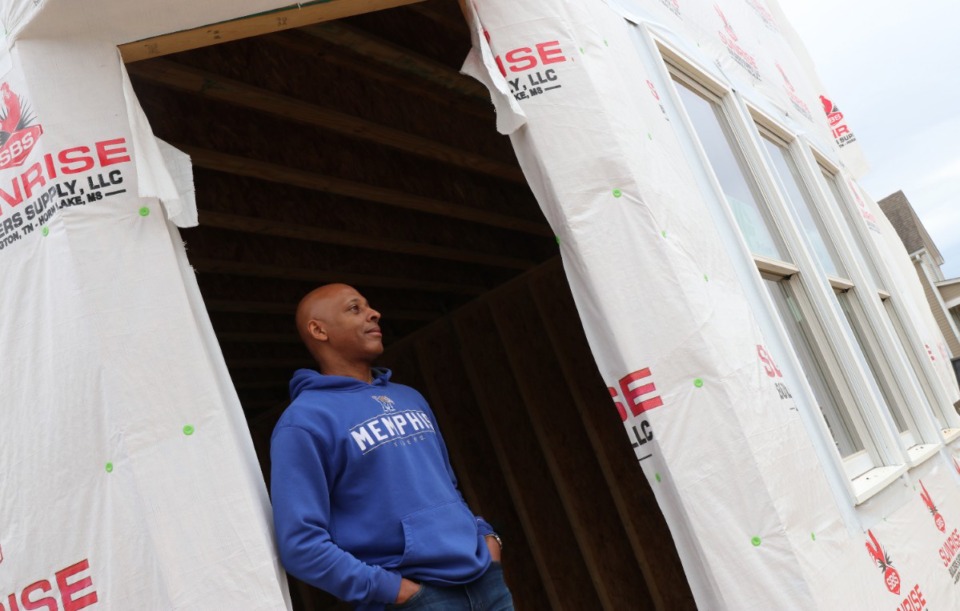 <strong>Andre Jones of Jones Urban Development stands inside a doorway of a soon-to-be fourplex at Malone Park Commons. The second phase of development in Uptown is expected to finish in September.</strong> (Neil Strebig/Daily Memphian)