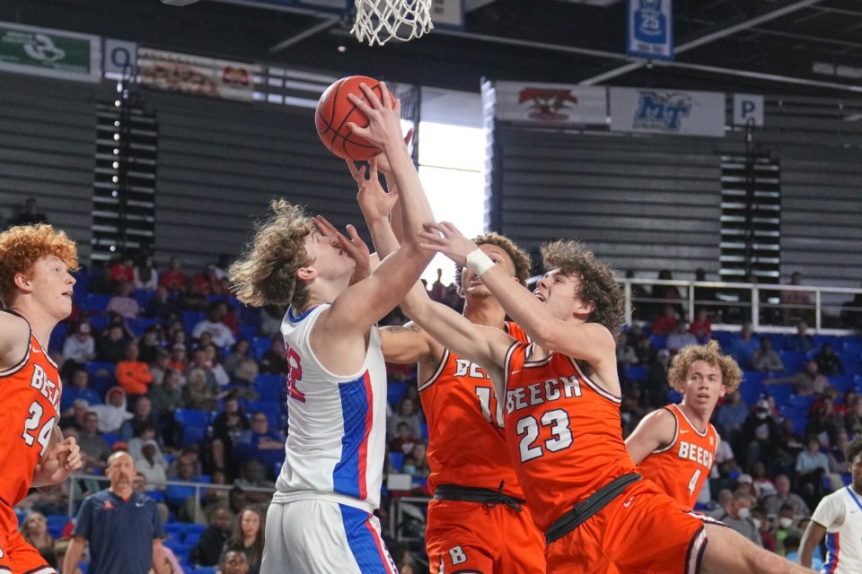 <strong>Bartlett's Jackson Shackelford (12) rebounds against Beech's Eli Rice (11) and Beech's JP Courtney (23) during their first round TSSAA State Championship playoff game.</strong> (Harrison McClary/The Daily Memphian)