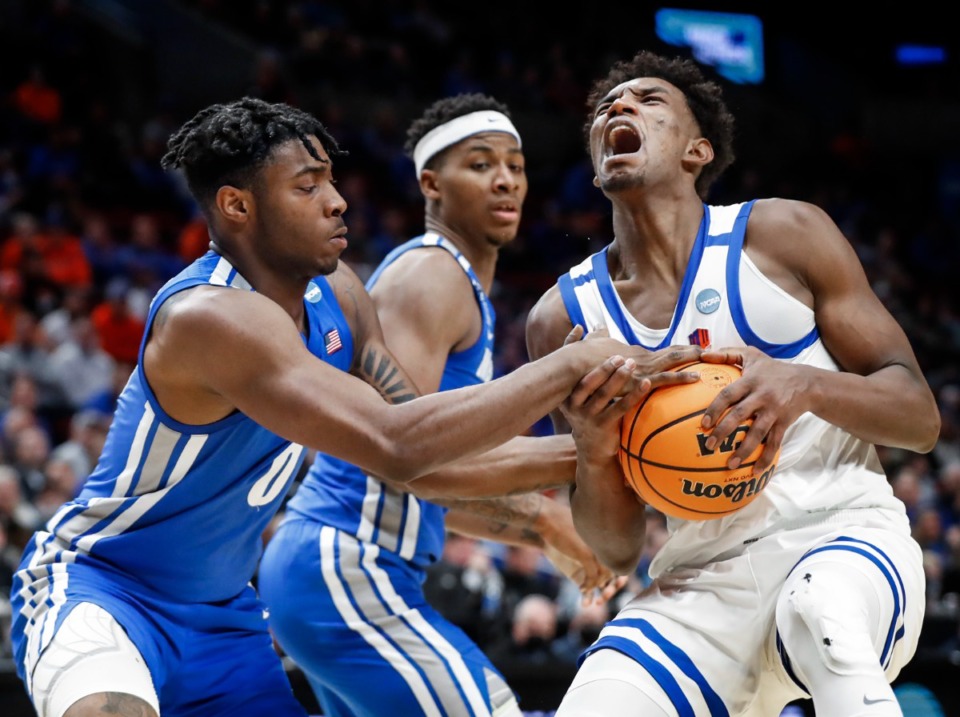 <strong>Tigers defender Earl Timberlake (left) applies pressure to Boise State guard Abu Kigab (right) on Thursday, March 17, 2022, in Portland, Oregon.</strong> (Mark Weber/The Daily Memphian)
