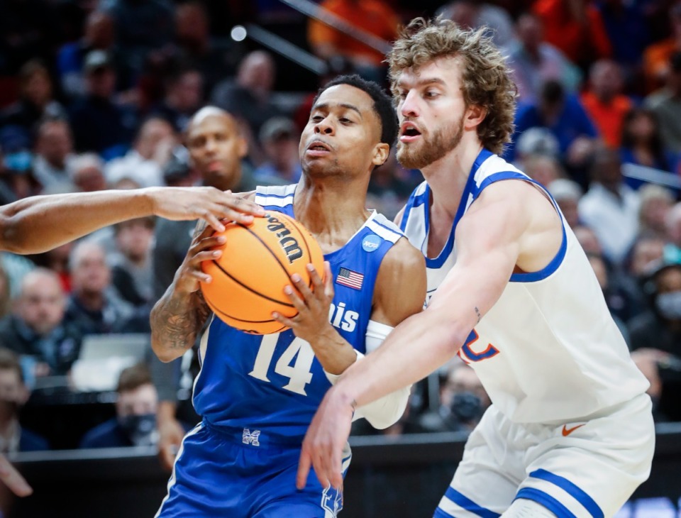 <strong>Tigers guard Tyler Harris (left) drives the lane against Boise State&rsquo;s Max Rice (right) on Thursday, March 17, 2022, in Portland, Oregon.</strong> (Mark Weber/The Daily Memphian)
