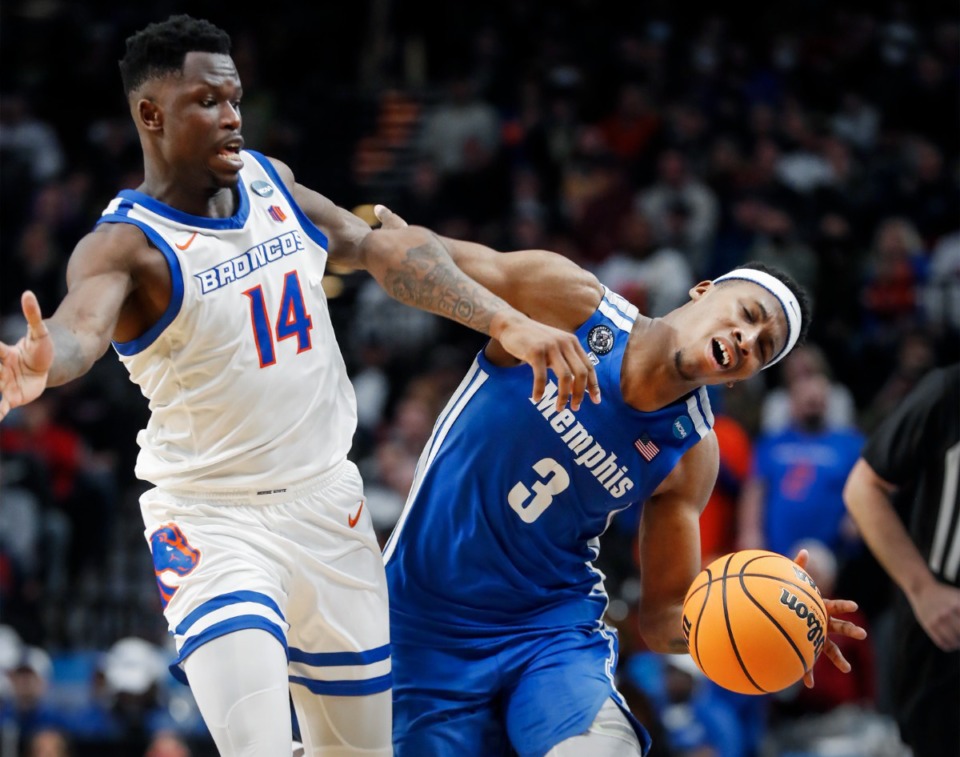<strong>Tigers guard Landers Nolley II (right) is fouled by Boise State&rsquo;s Emmanuel Akot (left) on Thursday, March 17 in Portland, Oregon.</strong> (Mark Weber/The Daily Memphian)