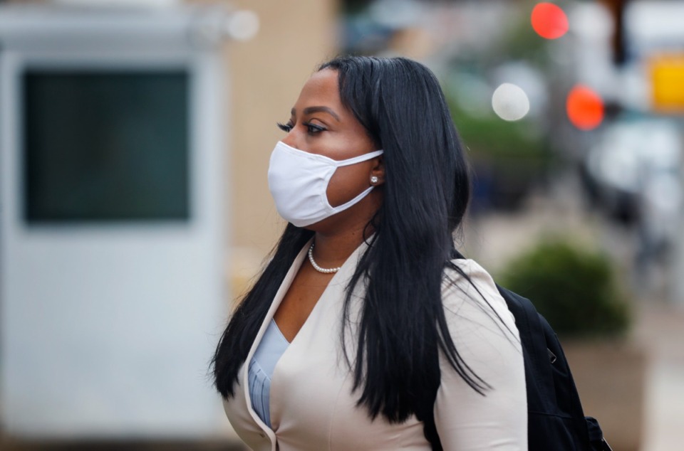 <strong>Katrina Robinson walks to federal court with her attorneys on Friday, Sept. 17, 2021.</strong> (Mark Weber/Daily Memphian file)