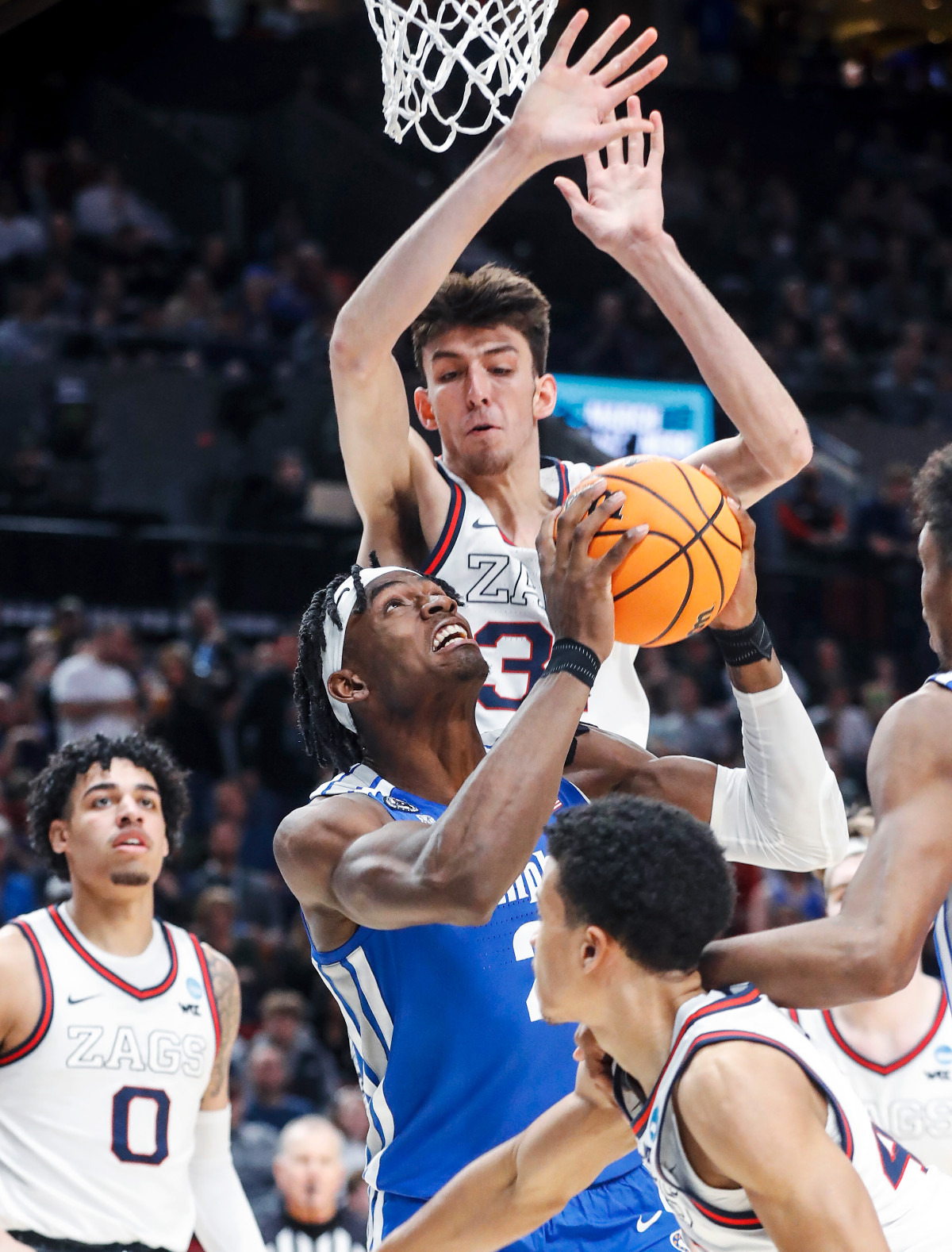 <strong>Tigers center Jalen Duren (middle) drives the lane against Gonzaga defender Chet Holmgren (top) during action on Saturday, March 19, 2022, at the NCAA tournament game in Portland, Oregon.</strong> (Mark Weber/The Daily Memphian)