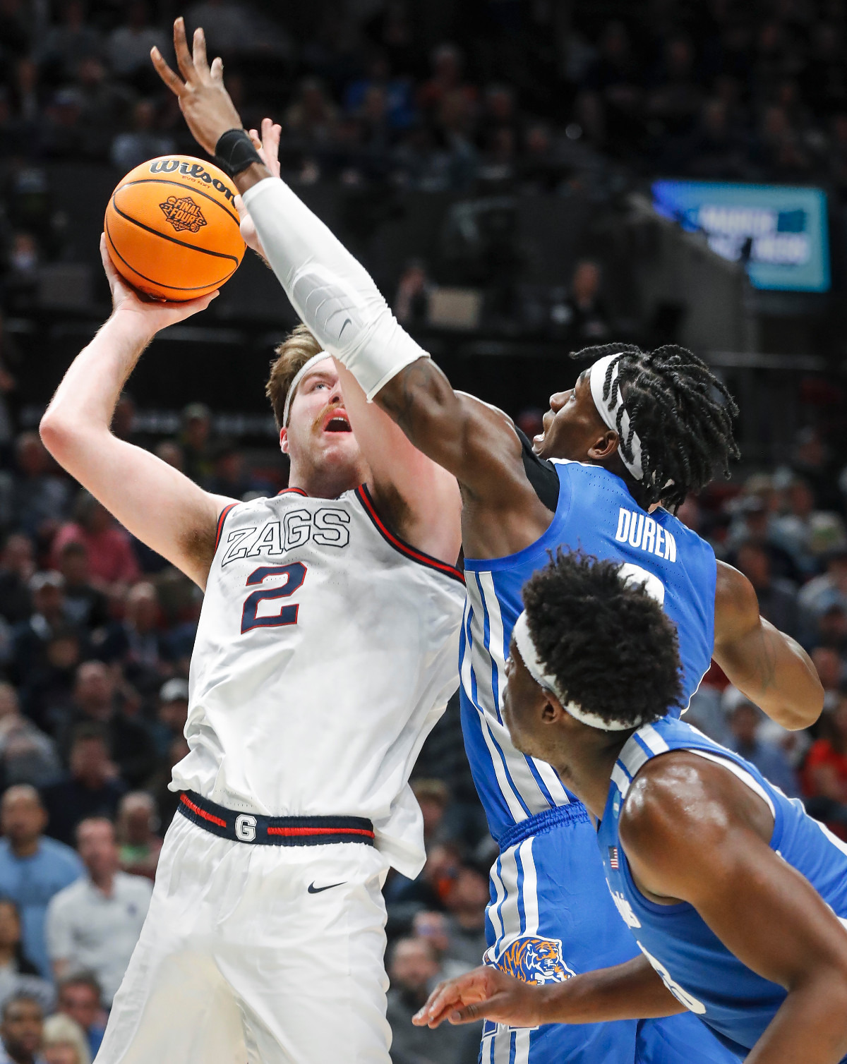 <strong>Tigers defender Jalen Duren (right) tries to block the shot Gonzaga center Drew Timme (left) during action on Saturday, March 19, 2022, at the NCAA tournament game in Portland, Oregon.</strong> (Mark Weber/The Daily Memphian)