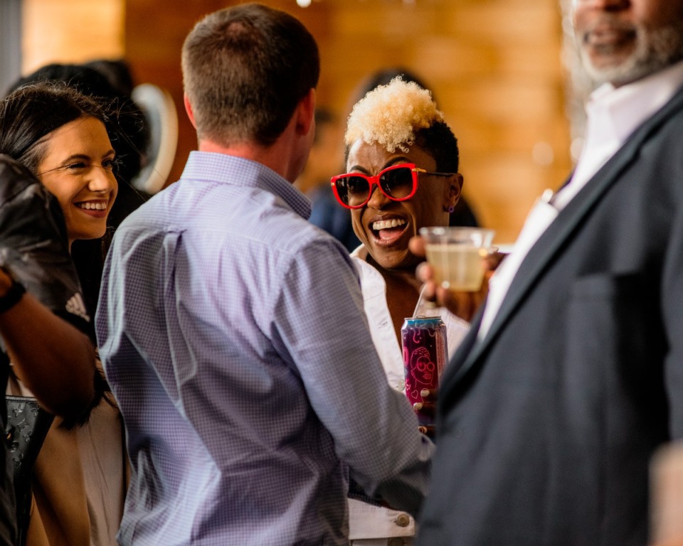 <strong>Paula Raiford chats with some friends during a reveal party at Grind City Brewing.</strong>&nbsp; (Houston Cofield/Special To The Daily Memphian)