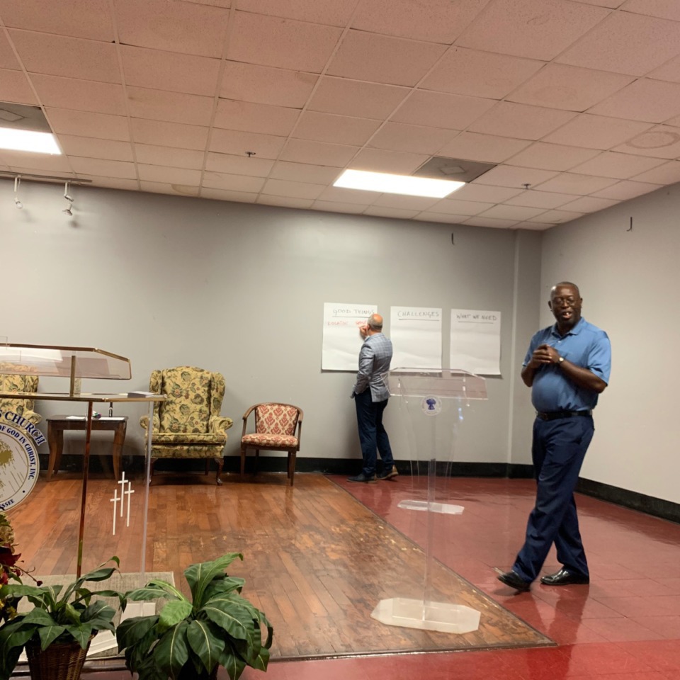 <strong>Charles Everett (right) gets community feedback during an Uplift Westwood town hall meeting in August 2019, while Michael Deutsch takes notes on a whiteboard.&nbsp;</strong>(Elle Perry/Daily Memphian)