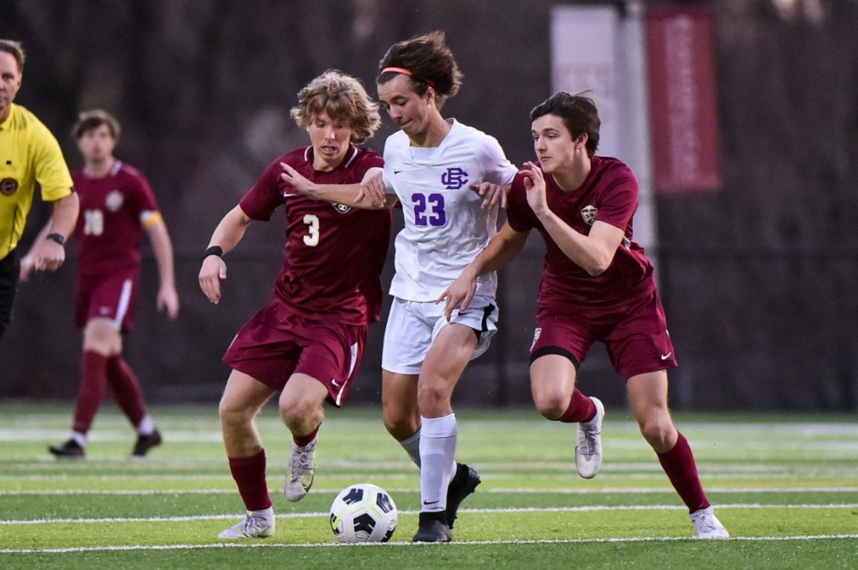 <strong>CBHS&rsquo; Hudson Carr looks for a shot on goal as ECS&rsquo;&nbsp; Jay Smith defends on March 22.</strong> (Justin Ford/ Special to The Daily Memphian)