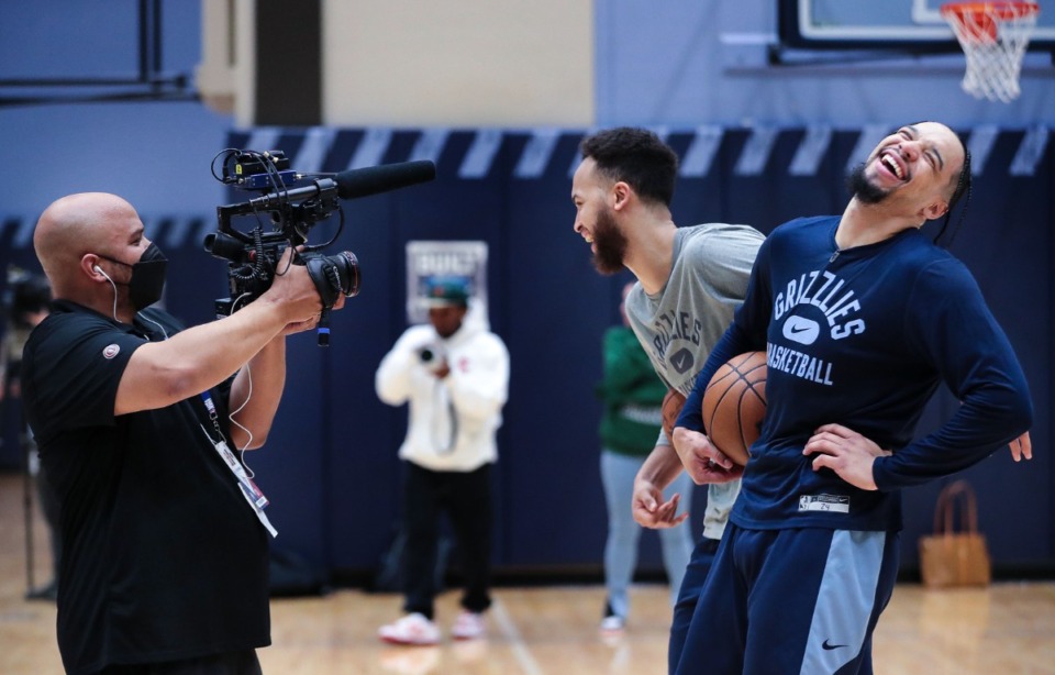 <strong>Memphis Grizzlies forward Kyle Anderson makes his teammate Dillon Brooks laugh during an ESPN interview March 22, 2022, at FedExForum.</strong> (Patrick Lantrip/Daily Memphian)