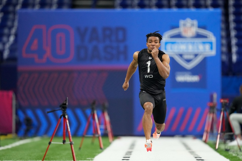 <strong>Memphis wide receiver Calvin Austin III runs the 40-yard dash at the NFL football scouting combine, Thursday, March 3, 2022, in Indianapolis.</strong> (AP Photo/Charlie Neibergall)